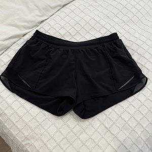 Black Lululemon Hotty Hot shorts (12 Tall)